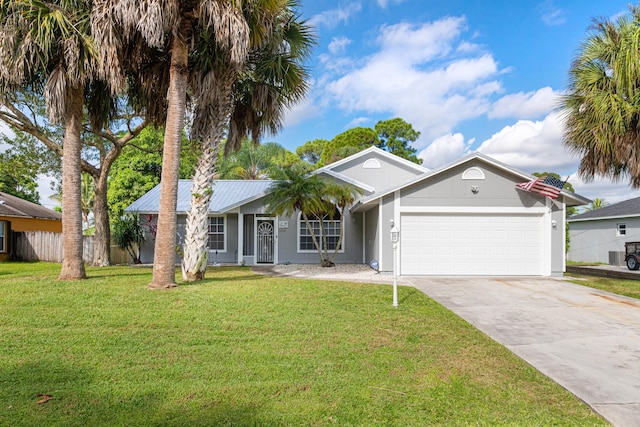 ranch-style home with a front lawn and a garage