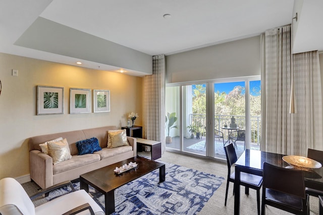 living room with light colored carpet