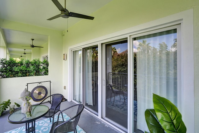 exterior space featuring ceiling fan