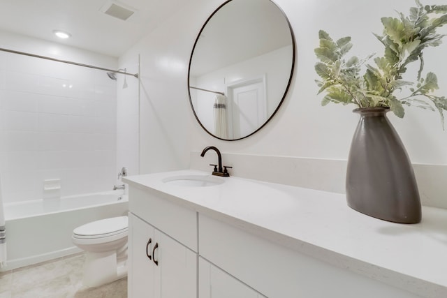 full bathroom featuring vanity, toilet, and tiled shower / bath combo