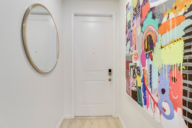 doorway to outside featuring light hardwood / wood-style floors