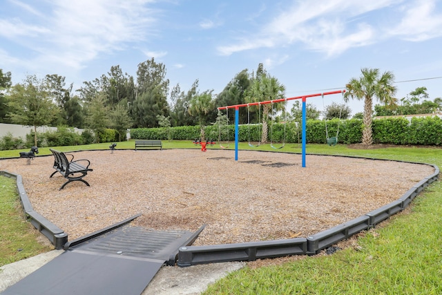 view of jungle gym with a lawn