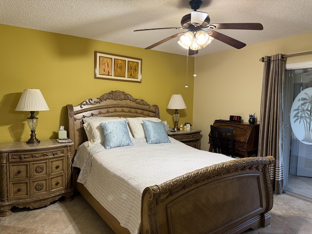 bedroom with ceiling fan, access to outside, and a textured ceiling