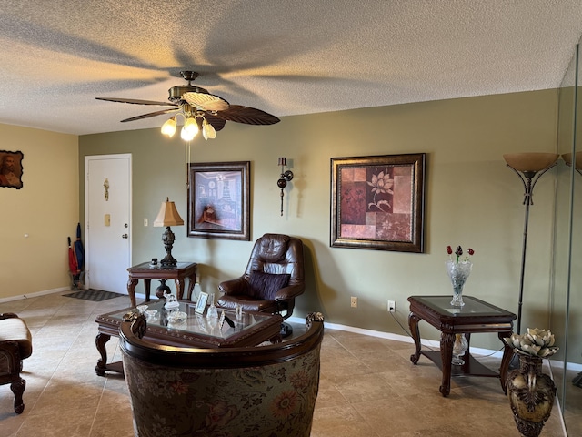 tiled dining room with a textured ceiling