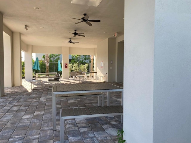 view of patio with ceiling fan