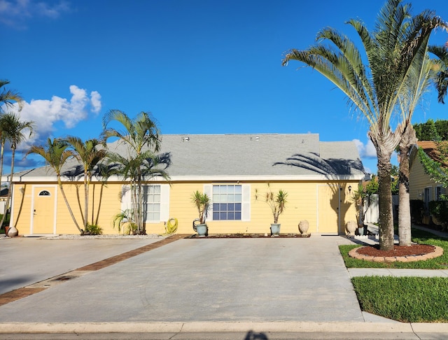 single story home with a garage