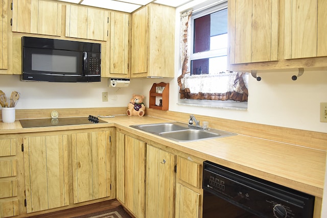 kitchen featuring sink, black appliances, and light brown cabinets