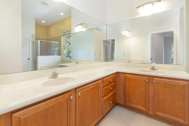 bathroom with vanity, separate shower and tub, and tile patterned floors