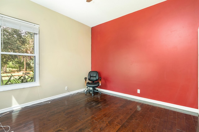 spare room with dark hardwood / wood-style flooring