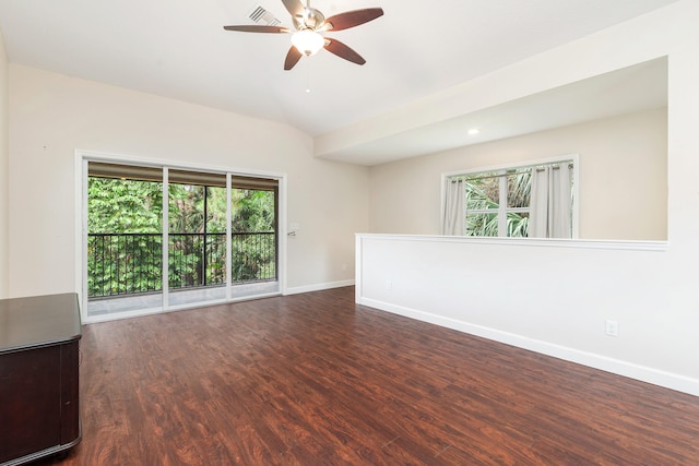 empty room with dark wood-type flooring and ceiling fan