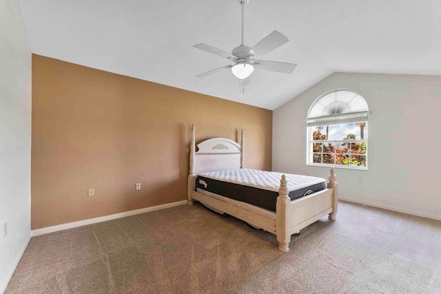 bedroom featuring carpet, vaulted ceiling, and ceiling fan