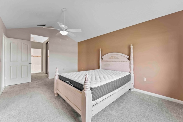 bedroom featuring vaulted ceiling, ceiling fan, and carpet floors