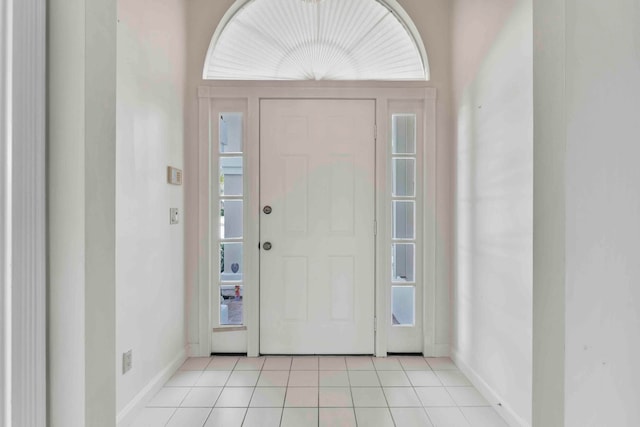 tiled foyer with plenty of natural light