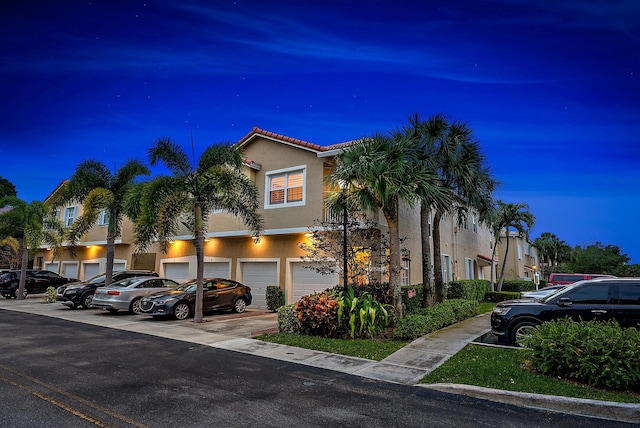 exterior space with a garage