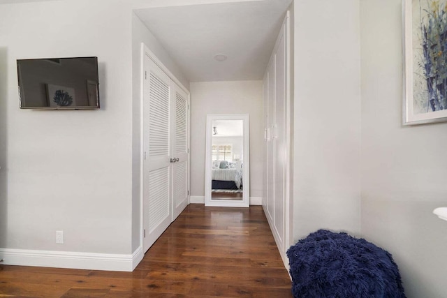 hall featuring dark hardwood / wood-style floors