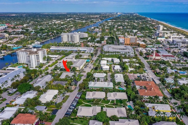 drone / aerial view with a water view