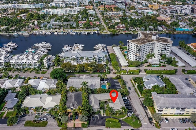 birds eye view of property featuring a water view