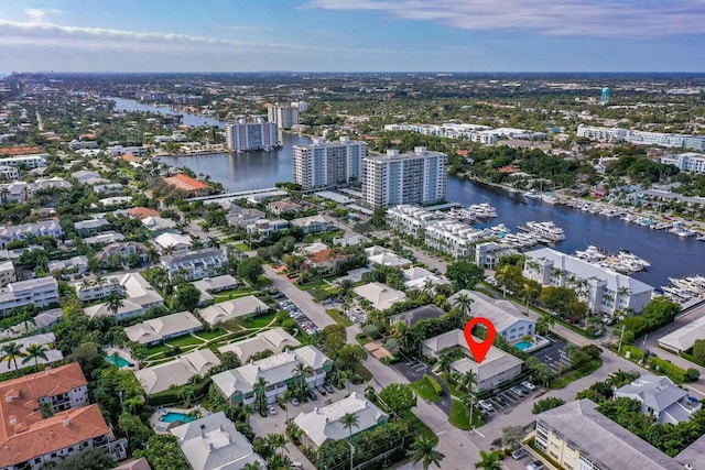 birds eye view of property featuring a water view