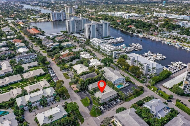 birds eye view of property featuring a water view