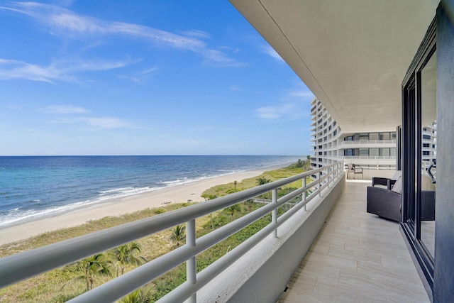 dining room featuring floor to ceiling windows and a water view