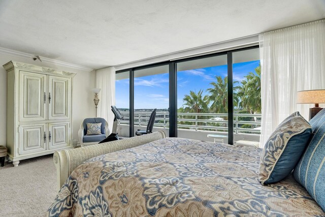 bedroom featuring ornamental molding and light colored carpet