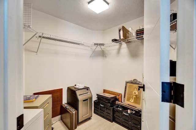 spacious closet with light wood-type flooring