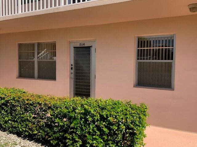 doorway to property featuring a balcony