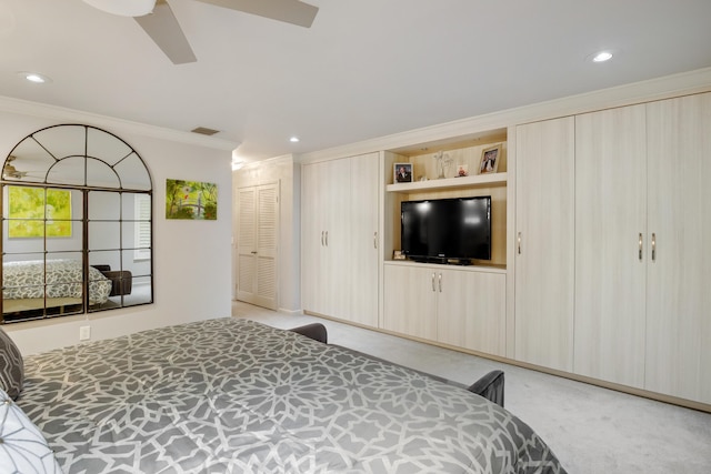 bedroom featuring light carpet, ceiling fan, and ornamental molding