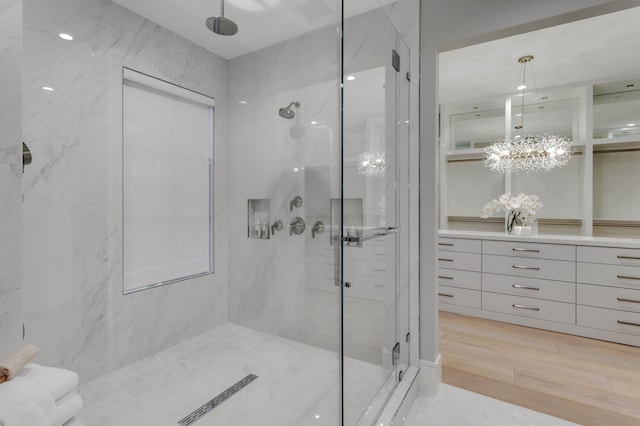 bathroom with vanity and a washtub