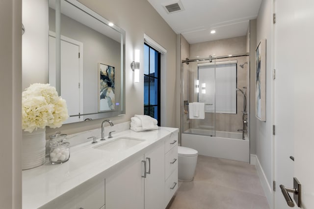 bedroom featuring ensuite bath