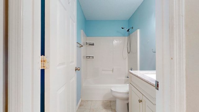 bathroom featuring tile patterned floors, vanity, and toilet