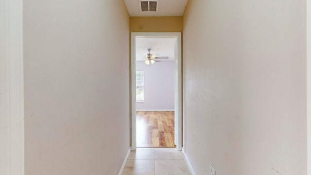 corridor featuring light hardwood / wood-style flooring