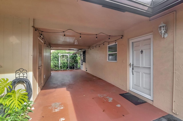 view of patio featuring a carport