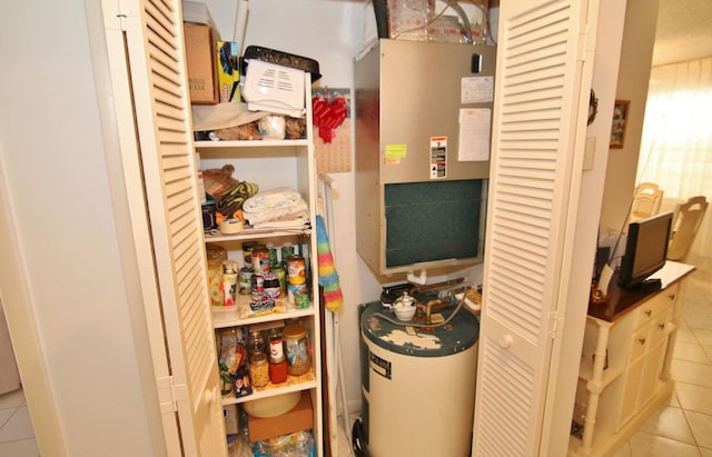 pantry featuring electric water heater