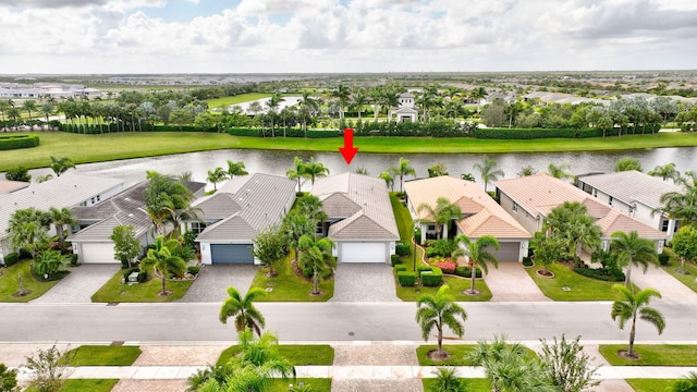 drone / aerial view featuring a water view