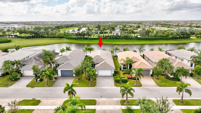 10571 SW Sunray St, Port Saint Lucie, FL 34987 - aerial view of residential area with a large body of water