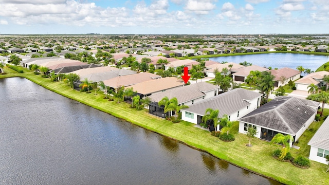 drone / aerial view with a water view