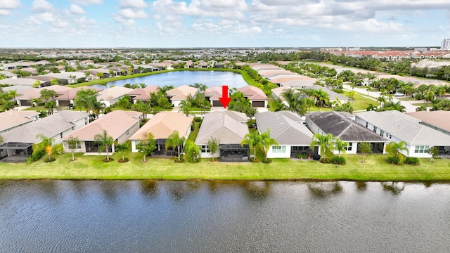 bird's eye view with a water view