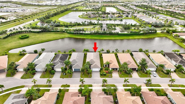 10571 SW Sunray St, Port Saint Lucie, FL 34987 - aerial perspective of suburban area with a large body of water