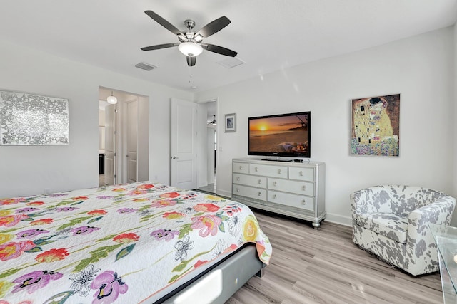 10571 SW Sunray St, Port Saint Lucie, FL 34987 - bedroom with wood finished floors, ceiling fan, and baseboards