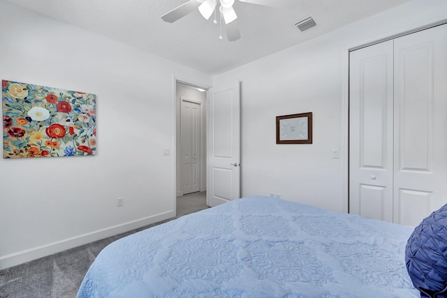 carpeted bedroom with a closet and ceiling fan