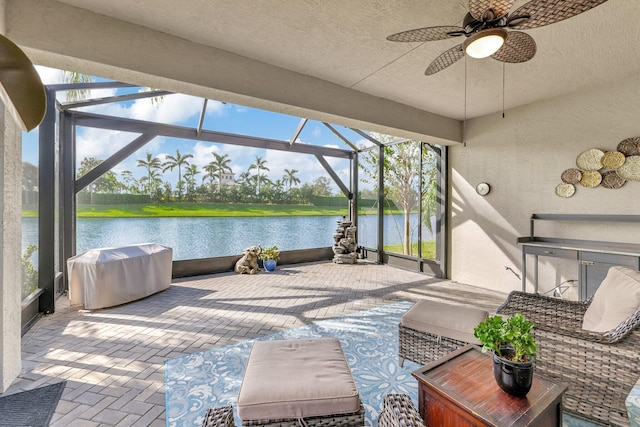 10571 SW Sunray St, Port Saint Lucie, FL 34987 - view of patio / terrace featuring a water view, glass enclosure, ceiling fan, and a grill