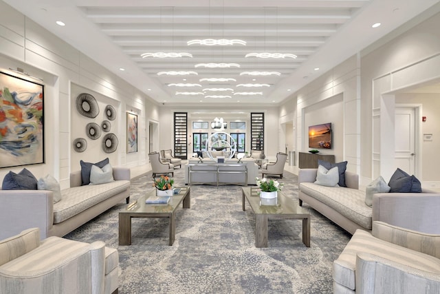 10571 SW Sunray St, Port Saint Lucie, FL 34987 - carpeted living area featuring a raised ceiling and recessed lighting
