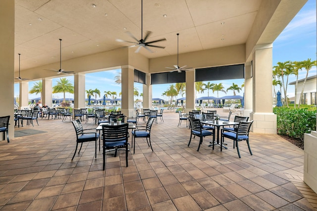 view of patio featuring ceiling fan