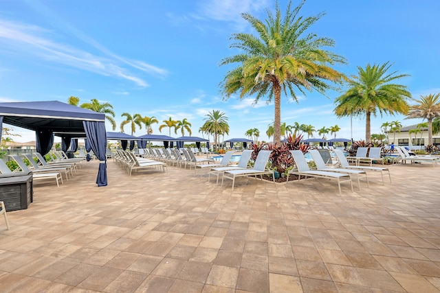 view of swimming pool featuring a gazebo and a patio area