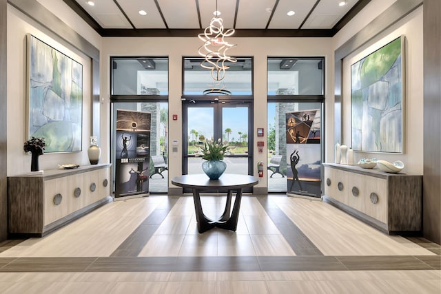 interior space featuring french doors and a chandelier