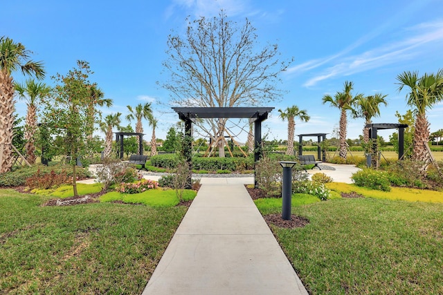 10571 SW Sunray St, Port Saint Lucie, FL 34987 - view of home's community with a yard