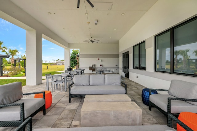 view of patio featuring outdoor lounge area and ceiling fan