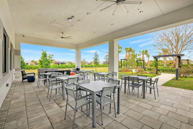 view of patio / terrace featuring ceiling fan