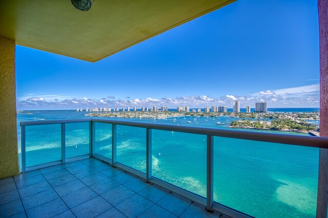 balcony featuring a water view